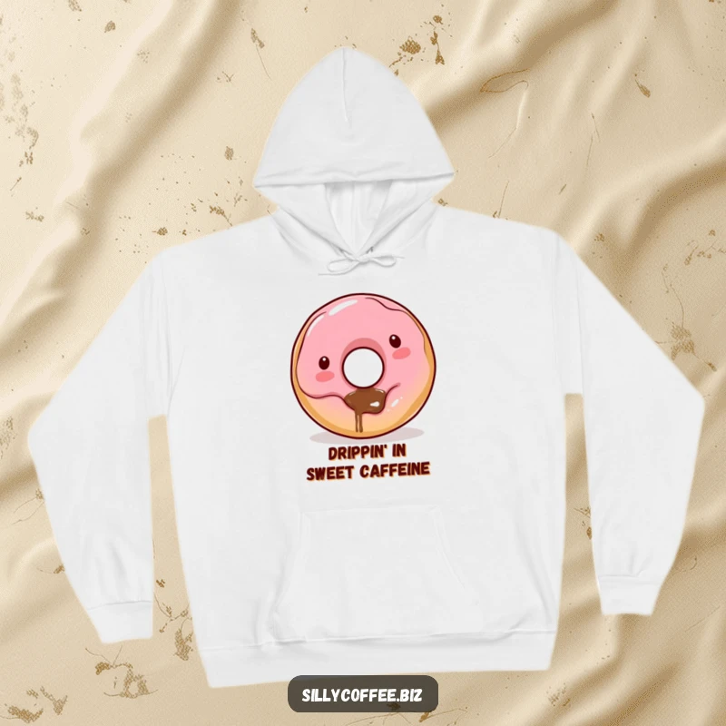 Funny Kawaii donut character with coffee dribbling from its hole, featured on a warm and humorous hoodie.