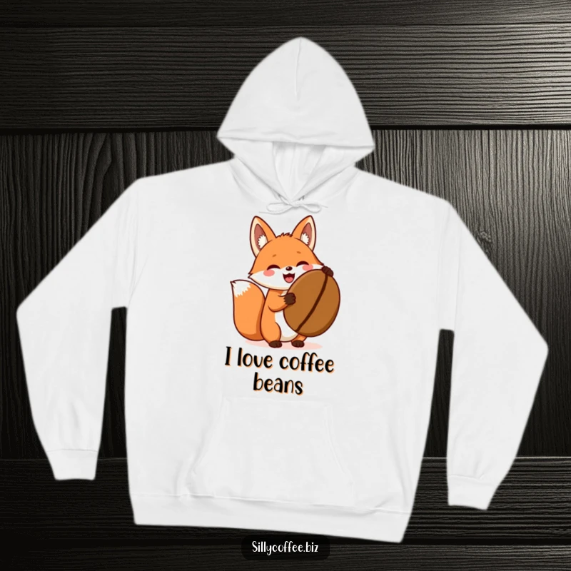 Funny hoodie featuring an excited kawaii fox holding a giant coffee bean, perfect for cozy coffee moments.