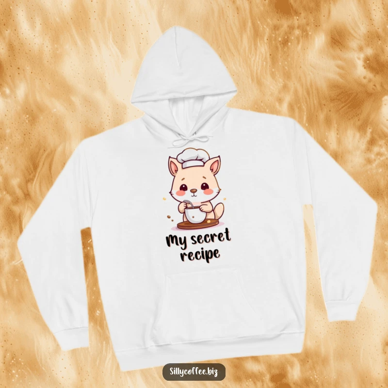 Funny Hoodie illustrating a tiny animal chef stirring a cup of coffee, symbolizing culinary creativity and caffeine.