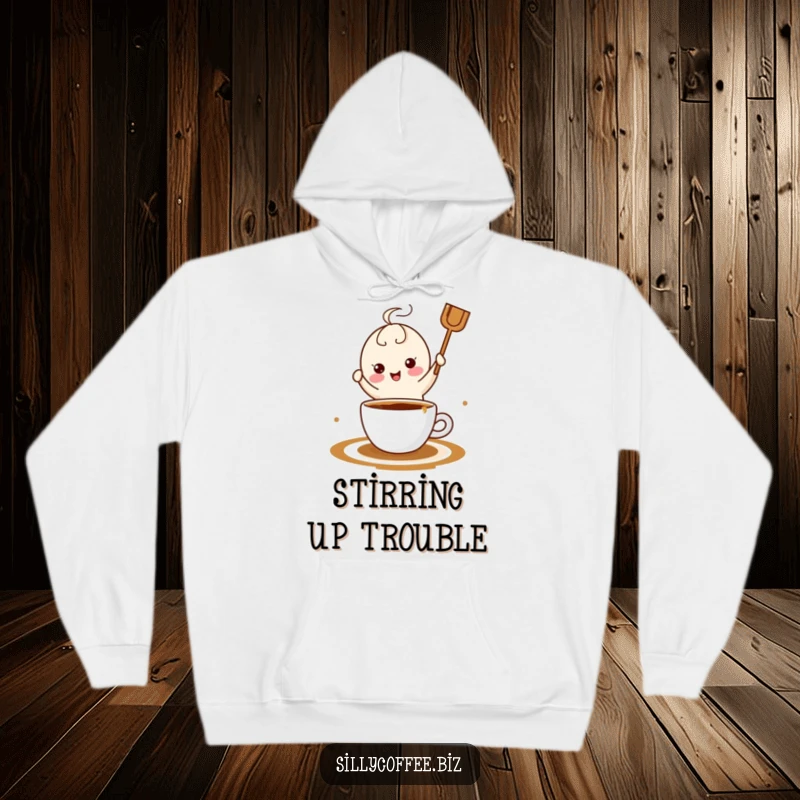 Funny kawaii coffee stirrer happily dancing in spilled coffee, featured on a cozy, warm hoodie for ultimate comfort.